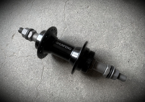 Втулка задняя SHUNFENG SF-A223R алюм. 36отв гайки на пром. подшипнике из алюминия под трещотку